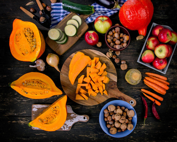 Autumn food composition on a dark wooden background. - Фото, изображение