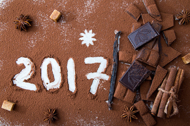 Composition de Noël. Chocolat, cacao, cannelle et vanille
  - Photo, image