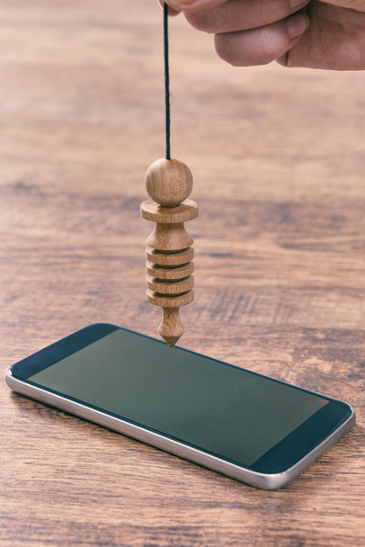 Controllo smartphone con pendolo
 - Foto, immagini