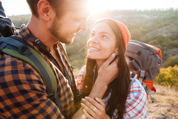 Attractive couple in the mountains - 写真・画像