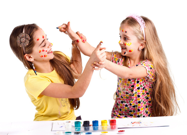 twee meisjes geschilderd - Foto, afbeelding
