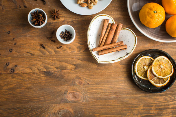 Christmas spices, ingredients for mulled wine on table - 写真・画像