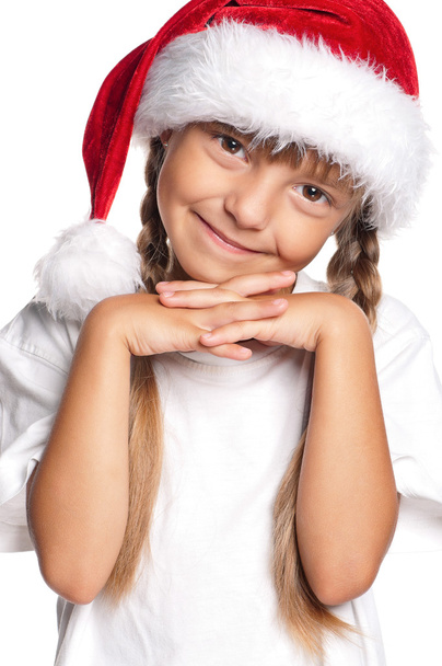 Little girl in Santa hat - Foto, Imagem
