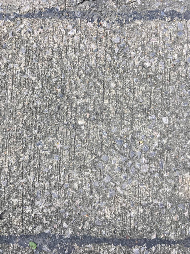 rough stone in concrete footpath texture. - Photo, Image