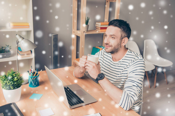 Happy man drinking coffee and dreaming on winter background - Zdjęcie, obraz