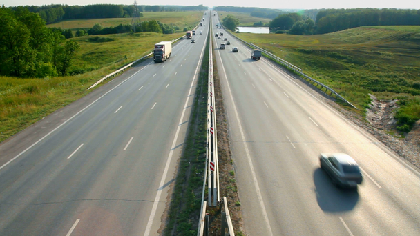 Cars traveling on the highway - timelapse - Materiał filmowy, wideo