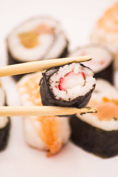 Pieces of sushi on white background - Photo, Image