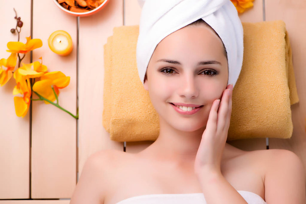 Young woman relaxing in spa in health concept - Photo, Image