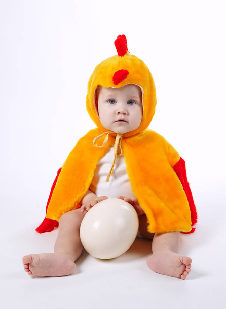 little funny boy in chicken costume - Fotó, kép