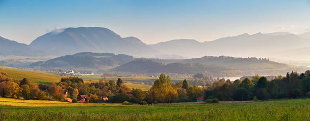 Slovakia autumn sunny morning panorama. Rural fall scene - Photo, Image