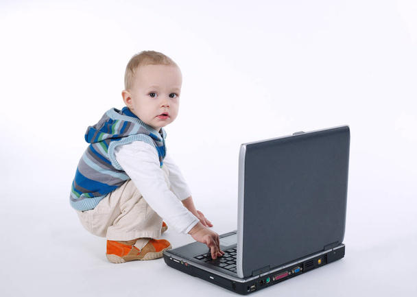 cute boy with laptop on white - Foto, immagini