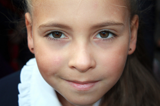 Closeup image of a beautiful little girl - Фото, изображение
