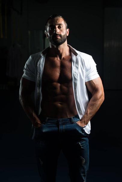 Sexy Italian Man Posing In White Shirt - 写真・画像