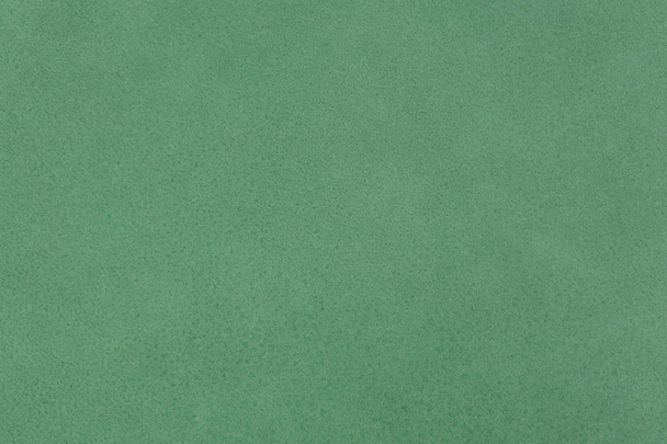 Close up of a green leather texture. - Foto, imagen