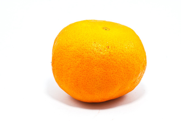 Single orange on white background - Foto, imagen