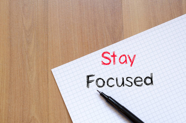 Stay focused concept on notebook - Foto, Imagem