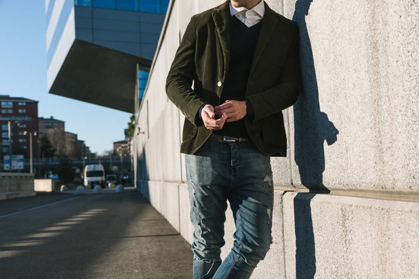 Young handsome man posing in an urban context - Fotoğraf, Görsel