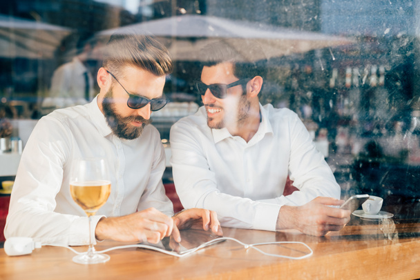 business men sitting in a bar - Photo, Image