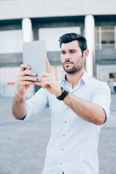 businessman using tablet taking photos - Photo, Image