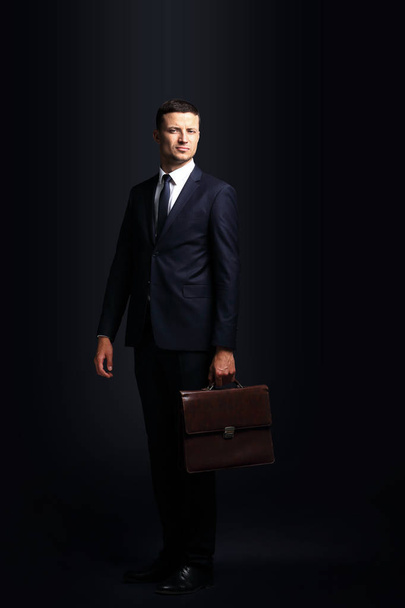 Businessman with briefcase - Фото, зображення