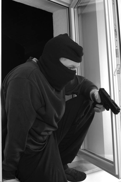 Murderer with the handgun - Photo, Image
