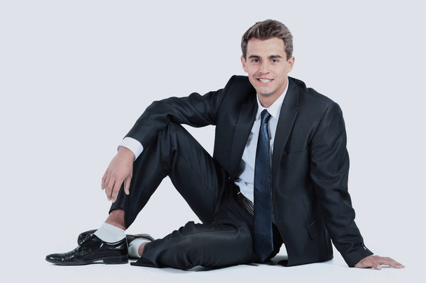 business man sitting isolated on a white background - Foto, imagen