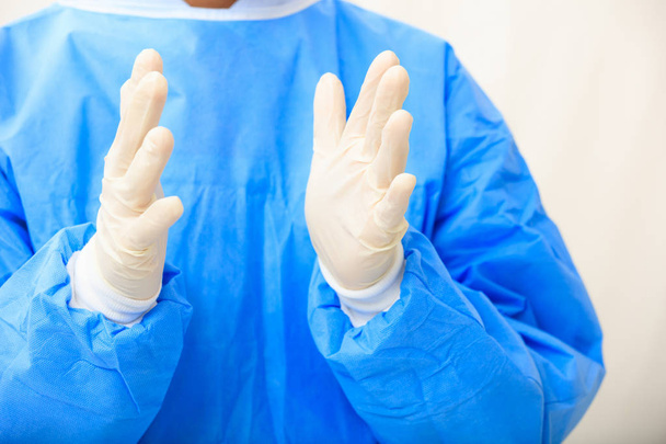 Surgeon wearing latex gloves - Photo, Image