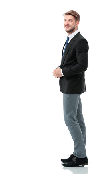 Side view of a smiling businessman, On white background - Foto, imagen
