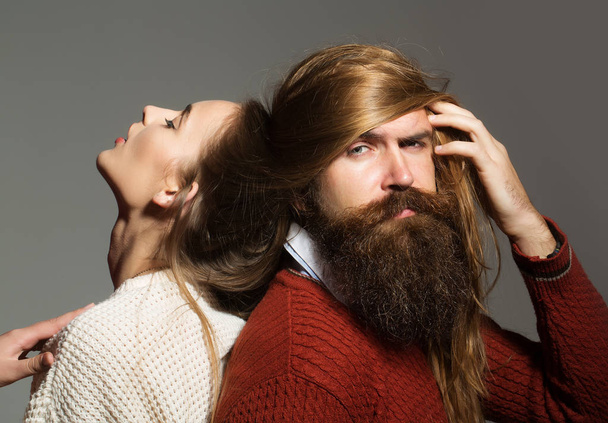 Young couple with messy hair - Valokuva, kuva