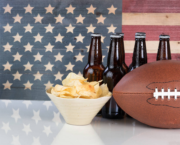 American football plus food and drink with United States flag in - Foto, afbeelding