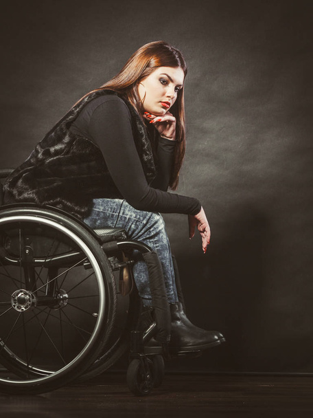 Sad girl on wheelchair - Foto, Bild