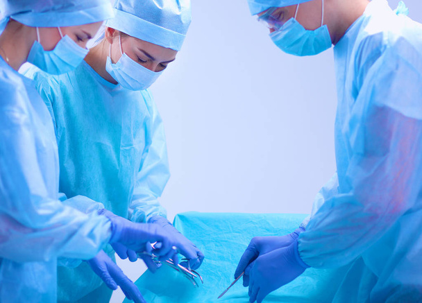 Team surgeon at work in operating room - Fotó, kép