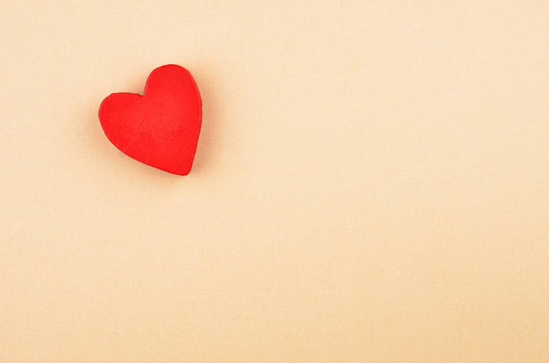 Heart on cardboard background - Фото, изображение