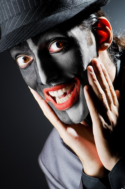 biznesmen z malowanie twarzy klauna - Zdjęcie, obraz