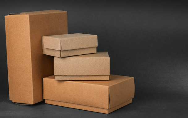 Boxes on gray background - Foto, imagen