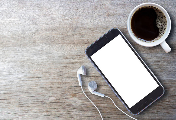 Smart phone and earphone with cup of coffee - Foto, Imagem