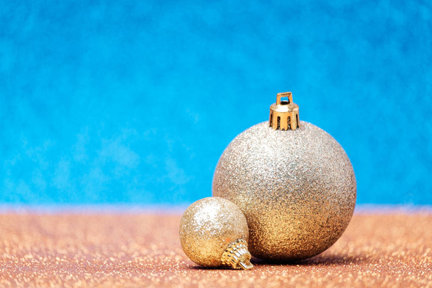 Christmas decorations on a glitter background - Photo, Image