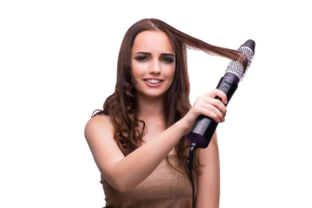 Young beautiful woman with hair dryer isolated on white - Foto, afbeelding