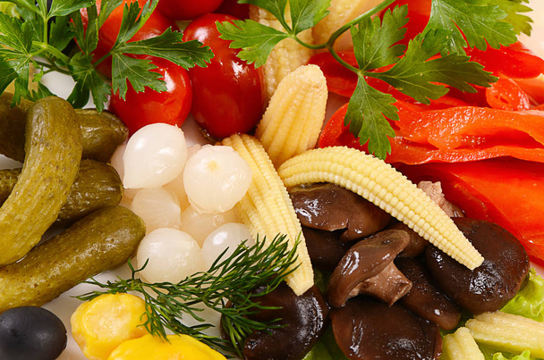 Assorted marinated vegetables and mushrooms - Foto, imagen