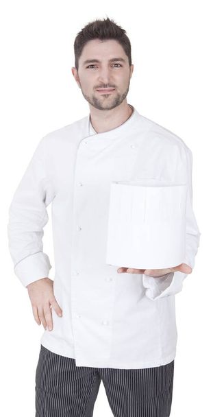 chef holds up toque blanche - Фото, зображення
