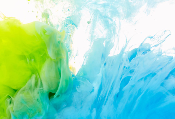 Paint splashes in water - Valokuva, kuva