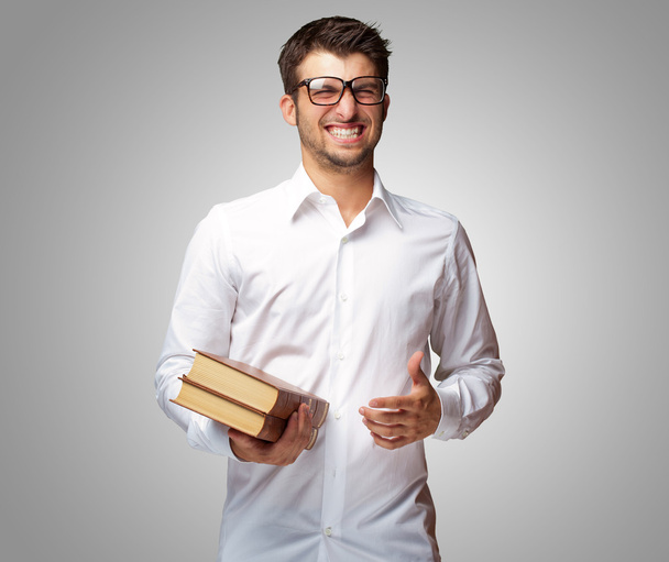Portrait Of A Student Holding Book - Zdjęcie, obraz