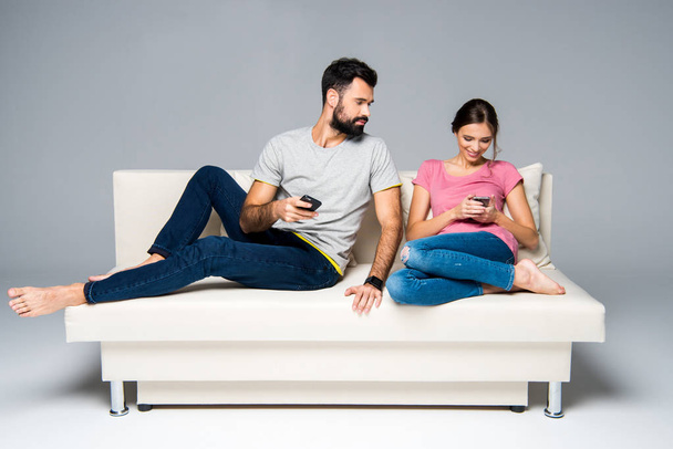 Couple using smartphones  - Photo, image