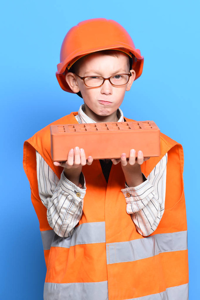 young cute builder boy - Valokuva, kuva