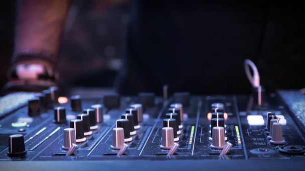 DJ mixer at night in club - Фото, изображение