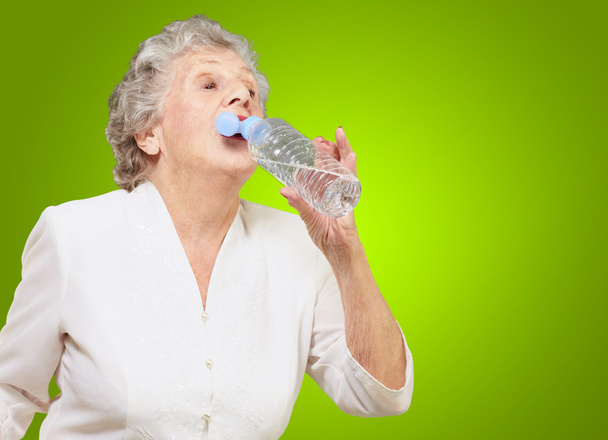 Mature Thirsty Woman Drinking Water - Photo, Image