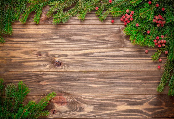 Árvore de abeto de Natal em fundo de madeira
 - Foto, Imagem