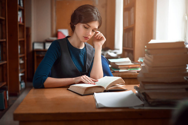 clever student woman in library - Photo, Image