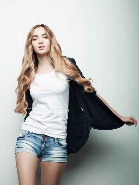 Young fashion model posing in studio - Zdjęcie, obraz