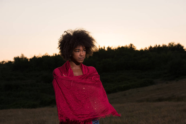 outdoor portrait of a black woman with a scarf - Photo, image
